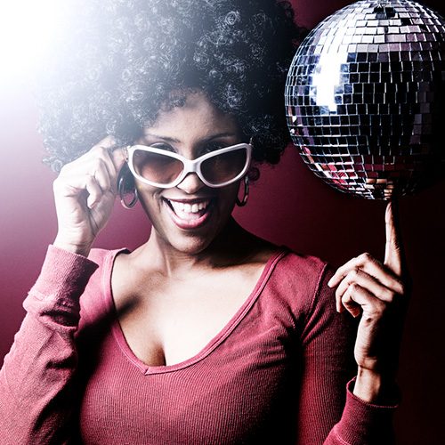 70s disco girl with a disco ball and a big afro hair